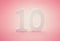 Number ten 10 on pink background. Conceptual image