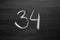 number thirty four enumeration written with a chalk
