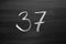 Number thirty seven enumeration written with a chalk
