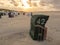 Numbered booths on the sand of the Juist island beach, Germany during sunset