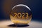 The numbers 2023 in a glass sphere