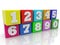 Numbers on different colored toy blocks