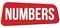 NUMBERS text on red trapeze stamp sign