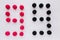 The numeral nine is written in black and red on a white background