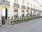 numerous bicycles for rent from the company GIRA parked and organized in parallel in downtown Lisbon