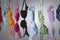 Numerous Colorful Bras Are Hung On A Close Line In A Studio Environment