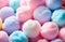 numerous colorful soft, fluffy cotton candy balls in pastel colors background. sweets, softness, comfort, skincare