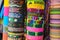 Numerous colorful wristbands with Oaxaca sight for sale at craft