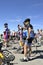 Numerous cyclists who climbed Mount Ventoux bike celebrate their