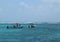 Numerous divers and snorkelers exploring Bacalar Chico National Park and Marine Reserve in Belize