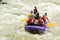 Numerous Family On Whitewater Rafting Trip