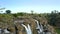 Numerous water streams fall down from rocks