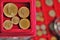 Numismatic at work shows some gold coins. Detailed view of an Indian gold coins collection