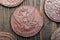 Numismatics. Old collectible coins made of copper on a old wooden table