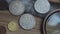 Numismatics. Old collectible coins on a wooden table