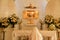 Nun kneeling in adoration of the Blessed Sacrament