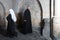 Nun passing priest