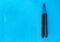 Nunchaku weapon isolated on Blue background. Black nunchaku training for beginner. Hot Tactical Gear Martial Arts Equipments