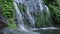 Nungnung Waterfall in Bali, Indonesia. Waterfall with powerful flow in Bali.