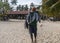 Nungwi, Zanzibar, Tanzania, Africa - January 2020: Black African Man is Carrying Tuna Fish on the Street Fish Market in
