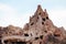 Nunnery inside volcanic rock landscape at Goreme - Cappadocia, T