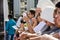 Nuns and Catholic faithful are praying during Corpus Christ mass