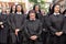 Nuns taking part in a procession for the Feast of Corpus Christi, in the streets of Krakow old town, Poland