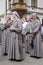 Nuns taking part in a procession for the Feast of Corpus Christi, in the streets of Krakow old town, Poland