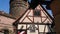 Nuremberg, Germany - August 29, 2018: Signboards and store windows on city streets on a sunny day