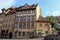 Nuremberg, Germany - August 29, 2018: Signboards and store windows on city streets on a sunny day