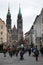 Nuremberg, Germany, January 2020. The medieval church of St. Lorenz. Tourists stroll to the sights on a cloudy day