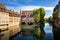 Nuremberg, Heilig-Geist-Spital which is reflected in the waters of the Pegnitz river. Franconia, Germany