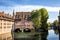 Nuremberg, Heilig-Geist-Spital which is reflected in the waters of the Pegnitz river. Franconia, Germany