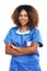 Nurse, arms crossed and portrait of black woman in studio isolated on white background. Medic, healthcare and confident