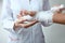 A nurse bandages a patient`s hand