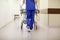 Nurse carrying hospital gurney to emergency room