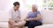 Nurse checking senior womans leg