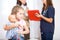 Nurse: Child Patient Holds Doll for Comfort