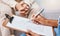 Nurse, clipboard and pen for checklist with patient, healthcare service and medical information. Closeup doctor hands