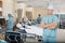 Nurse With Colleagues And Patient\'s In Hospital