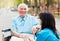 Nurse Consoling Senior Patient