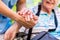 Nurse consoling senior woman holding her hand