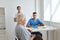 a nurse and a doctor examines a patient diagnostics health services