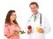 Nurse and Doctor Holding Health Food