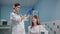 Nurse doctor taking tests from a woman, swab from the mouth