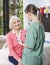 Nurse Examining Blood Pressure Of Patient In Rehabilitation Cent