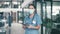 Nurse, face and mask in hospital or tablet for online advice, medical confidence or pandemic safety. Female person