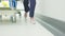 Nurse feet walking while pushing gurney for emergency