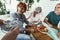 Nurse giving medicine to seniors at nursing home