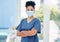 Nurse, healthcare black woman with a covid face mask in confident portrait. Innovation, leadership and proud medical